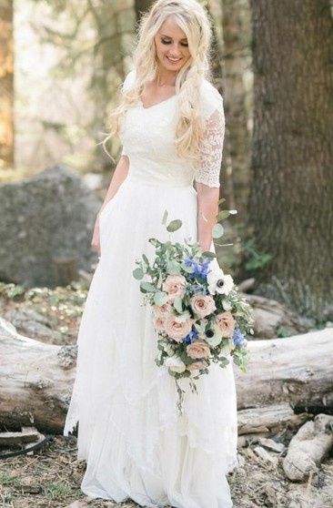 Featured image of post Knee Length Wedding Dresses For Women Over 40 - This modest wedding dress features a lace bodice with a rounded dip neckline and cap petal sleeves an empire waist accented with beading, flowing chiffon skirt, and a court length train.