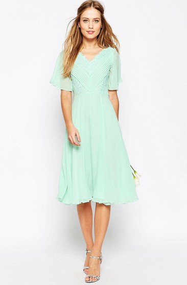 mint green knee length dress